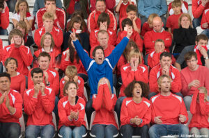 Fan amongst rivals at football match