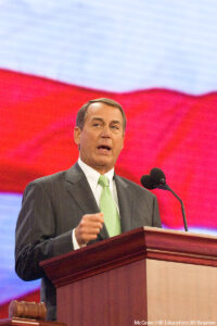 Head-and-shoulders view of Ohio Representative John Boehner speaking from the podium at the 2008 Republican National Convention in Saint Paul, Minnesota. McGraw-Hill Education/Jill Braaten. MHE World.
