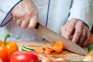 Chopped carrot, studio shot. Shutterstock / Nickola_Che. MHE World.