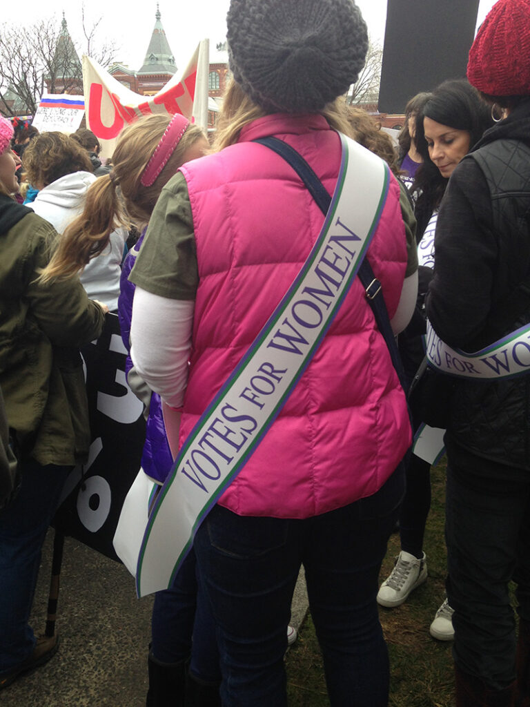 protester wearing sash