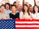 Group of people holding American flag