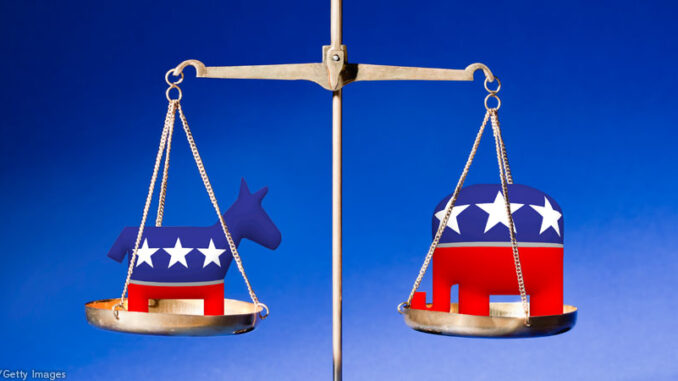 FS_01P_101113 Republican Party and Democratic Party flags on scales