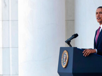 President Obama delivering remarks during a Memorial Day service in 2012