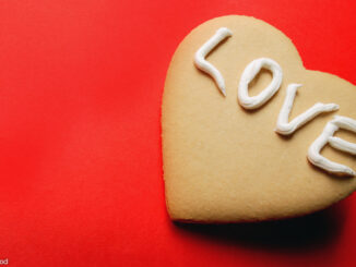 heart-shaped cookie with LOVE in icing
