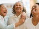 Three generations of African women laughing. ©Jose Luis Pelaez Inc/Blend Images LLC