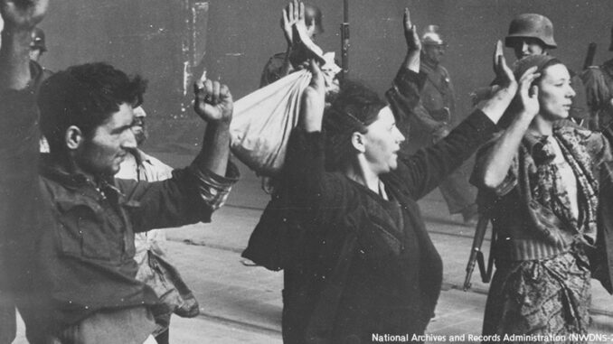 081414_01P_FS Prisoners. Copy of German photograph taken during the destruction of the Warsaw Ghetto, Poland, 1943.