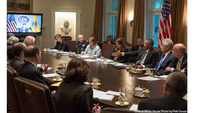 103114_03P_FS President Barack Obama convenes a meeting with cabinet agencies coordinating the government's Ebola response, in the Cabinet Room of the White House, Oct.15, 2014.