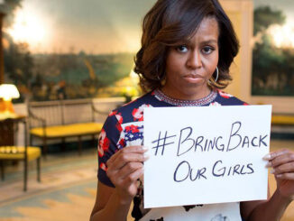 Michelle Obama holding up a sign #Bringbackourgirls. Photo: Official White House Photo