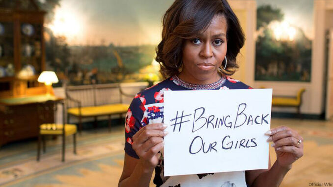 012315_01P_FS Michelle Obama holding up a sign #Bringbackourgirls. Photo: Official White House Photo