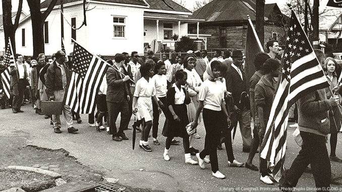 020515_01P_FS Participants marching in the civil rights march from Selma to Montgomery, Alabama in 1965.