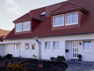 House in a residential area. Photo: George Hammerstein/Corbis/Glow Images.