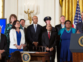President Barack Obama delivers remarks before he signs an executive order regarding further amendments to Executive Order 11478, Equal Employment Opportunity in the Federal Government, and Executive Order 11246, Equal Employment Opportunity, to protect LGBT employees from workplace discrimination, in the East Room of the White House, July 21, 2014. Photo: Official White House Photo by Pete Souza