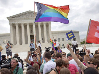 The crowd reacts as the ruling on same-sex marriage was announced outside of the Supreme Court in Washington, Friday June 26, 2015. Photo: AP Photo/Jacquelyn Martin