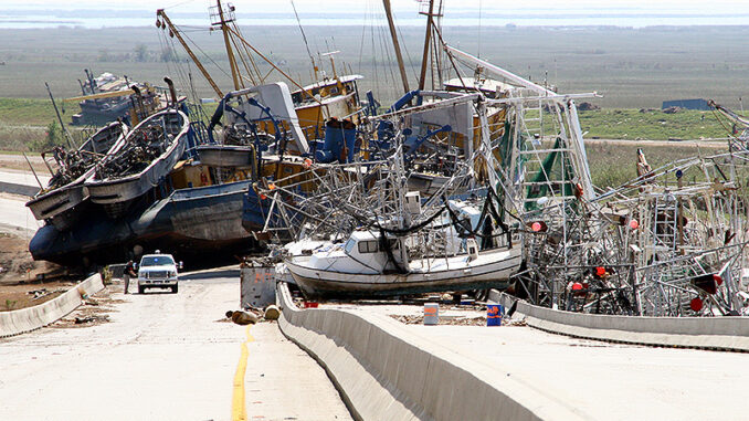 17867 Stacked up boats at bridge following Hurricane Katrina.
