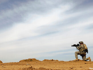 U.S. Army Sergeant provides security during a patrol of the Riyadh village in Iraq March 8, 2007. The Sergeant is assigned to Delta Company, 2nd Platoon, 2nd Battalion, 27th Infantry Regiment, 3rd Brigade Combat Team, 25th Infantry Division, Schofield Barracks, Hawaii.Stocktrek Images/Getty Images."MHE Canada MHE USA".