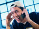 Businessman talking on a mobile phone. Purestock/SuperStock. MHE World.