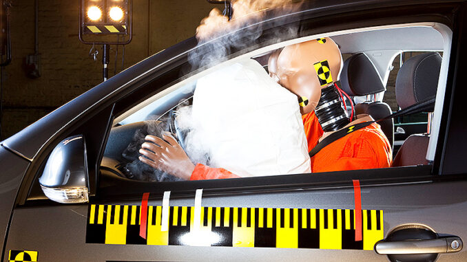 42-26366491 An airbag deploying during a crash test. © Caspar Benson/fstop/Corbis. Corbis. MHE Canada MHE USA.