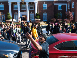 Activist and graduate student Jonathan Butler gestures to invite bystanders to join a "We Are Not Afraid" march including local and regional Concerned Student 1950 supporters Friday, Nov. 13, 2015 while in Greek town on Richmond Avenue on the University of Missouri campus in Columbia, Mo. (Daniel Brenner/Columbia Daily Tribune via AP) MANDATORY CREDIT. Daniel Brenner/Columbia Daily Tribune/AP Images. http://www.apimages.com/metadata/Index/University-Of-Missouri-Turmoil/6d659b410779467fa45a66c88ae04a19/1/0.