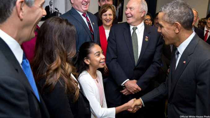 1_p121015ps-0100 President Barack Obama greets Kenmore Middle School eighth-grader Sofia Rios and the other stage participants prior to a bill signing ceremony for S. 1177, Every Student Succeeds Act, in the Eisenhower Executive Office Building South Court Auditorium, Dec. 10, 2015. Standing with Rios from left, Education Secretary Arne Duncan; Lily Eskelsen García, President, National Education Association; Todd Rokita, R-Ind.; Suzanne Bonamici, D-Ore.; and House Education Committee Chairman John Kline, R-Minn. (Official White House Photo by Pete Souza) https://www.whitehouse.gov/photos-and-video/photogallery/december-2015-photo-day