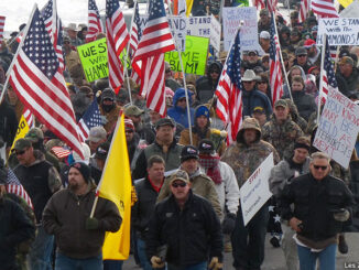 Protesters march on Court Avenue in support of an Oregon ranching family facing jail time for arson in Burns, Ore., Saturday, Jan. 2, 2016. Family members were convicted of the arsons three years ago and served time. But a judge ruled their terms were too short under federal law and ordered them back to prison for about four years each. Les Zaitz/The Oregonian/AP Images. http://www.apimages.com/metadata/Index/Ranching-Standoff-Protest/981dffea475246ecaa3564f55c8df9be/1/0