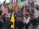 Protesters march on Court Avenue in support of an Oregon ranching family facing jail time for arson in Burns, Ore., Saturday, Jan. 2, 2016. Family members were convicted of the arsons three years ago and served time. But a judge ruled their terms were too short under federal law and ordered them back to prison for about four years each. Les Zaitz/The Oregonian/AP Images. http://www.apimages.com/metadata/Index/Ranching-Standoff-Protest/981dffea475246ecaa3564f55c8df9be/1/0