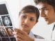 Indian doctors looking at x-rays. ©Jose Luis Pelaez Inc/Blend Images LLC. MHE World.