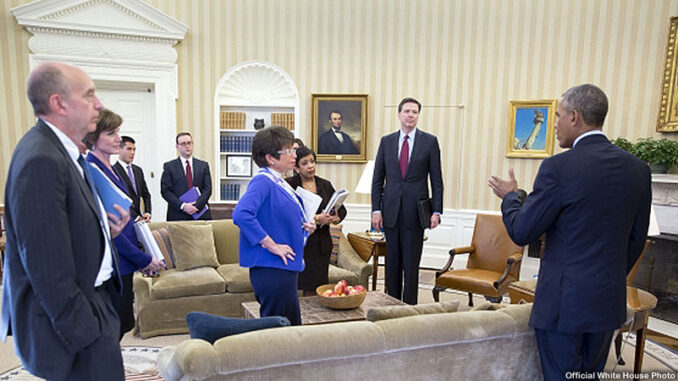 President Barack Obama speaks with the attendees following a meeting in the Oval Office on the executive actions he can take to curb gun violence, Jan. 4, 2016. Listening to the President, from left: Neil Eggleston, Counsel to the President; Deputy Attorney General Sally Yates; Eric Nguyen, Associate Counsel to the President; Michael Bosworth, Deputy Counsel to the President; Senior Advisor Valerie Jarrett; Attorney General Loretta Lynch; Natalie Quillian, Deputy Assistant to the President (partially hidden behind the Attorney General) and FBI Director James Comey. (Official White House Photo by Pete Souza)https://www.whitehouse.gov/photos-and-video/photogallery/january-2016-photo-day