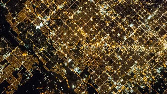 042816_01P_FS Image Description Super View of Glendale and Phoenix. NASA. MHE World.