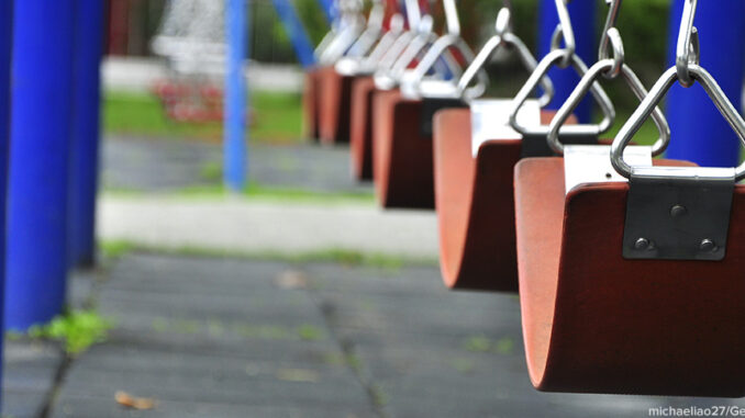 052516_01P_FS Close-up selective focus view of a row of empty swing seats at a playground in Chung Hsing New Village, Taiwan. michaeliao27/Getty Images. MHE Canada;MHE USA