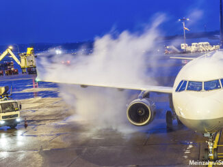 A ground crew deicing the wings of an aircraft. Meinzahn/iStockphoto/Getty Images. MHE Canada;MHE USA