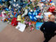 A policeman visits a makeshift memorial at the Dallas police headquarters, Monday, July 11, 2016, in Dallas. Five police officers were killed and several injured during a shooting in downtown Dallas last Thursday night. Eric Gay/AP Images. http://www.apimages.com/metadata/Index/APTOPIX-Police-Shootings-Dallas/2b62b93227e943d4b1bc1fbfe5886b30/1/0