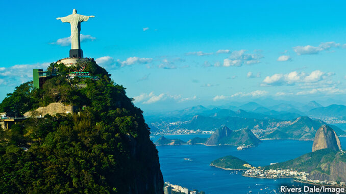 081616_01P_FS Christ the Redeemer statue overlooking Rio de Janeiro and Sugarloaf Mountain, Brazil. Rivers Dale/Image Source. MHE World.