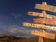 Conceptual deserted road sign. Chip Simons/Getty Images. MHE Canada;MHE USA.