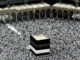 Muslim pilgrims prepare themselves for Friday prayers in front of the Kaaba, Islam's holiest shrine, at the Grand Mosque in the Muslim holy city of Mecca, Saudi Arabia.
