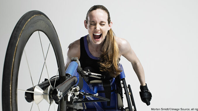 091916_02_FS Overjoyed female wheelchair athlete,