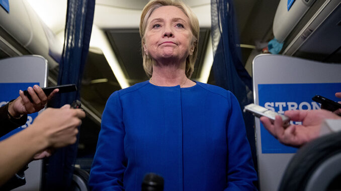 091916_03_IS-A Democratic presidential candidate Hillary Clinton pauses while she gives remarks on the explosion in Manhattan's Chelsea neighborhood onboard her campaign plane at Westchester County Airport, in White Plains, N.Y., Saturday, Sept. 17, 2016,