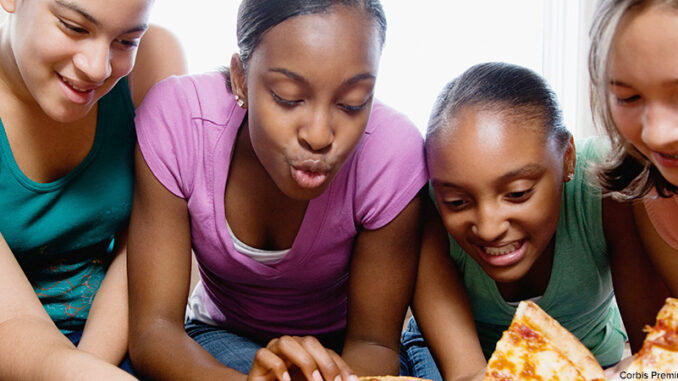 100416_01P_FS Five Teenagers Eating Pizza. Corbis Premium RF/Alamy. MHE World