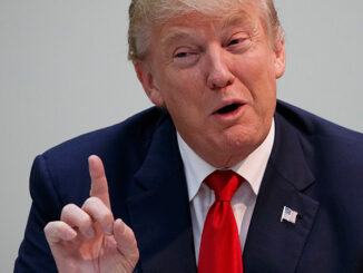 Republican presidential candidate Donald Trump gestures during a meeting on October 24 in St. Augustine, Florida
