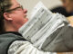 Election workers recount votes on Flint ballots, as they begin the process of a statewide recount on Wednesday, Dec. 7, 2016 at Genesee County Administration Building in Flint, Michigan