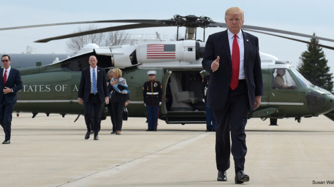 042017_02_FS President Donald Trump gives a thumb-up as he walks from Marine to Air Force One at General Mitchell International Airport in Milwaukee
