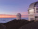 Mauna Kea telescopes at sunset on the Big Island of Hawaii. Credit: EastVillage Images/Shutterstock