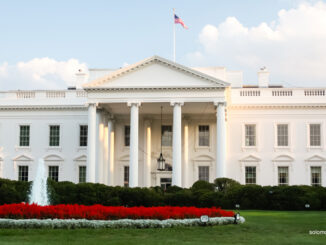 The White House n Washington, D.C. lit by the setting sun in the evening.