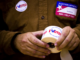 I voted stickers being passed out to people at a polling station