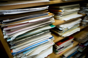 Stacks of old music notes - Shallow depth of field with focus on closest papers