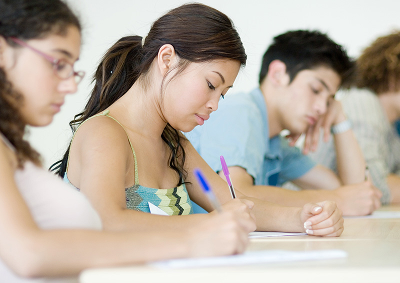 Students taking test in class