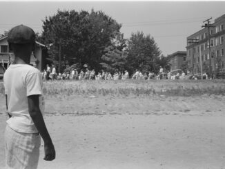 Little Rock, 1959. Mob marching from capitol to Central High