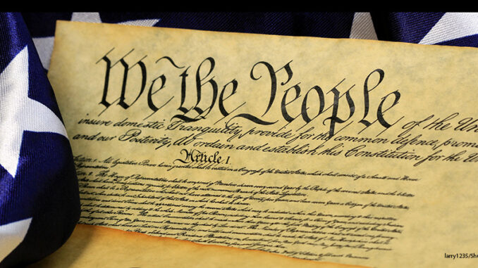 091018_01P_FS Constitution of the United States and American Flag, We The People