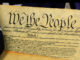 Constitution of the United States and American Flag, We The People
