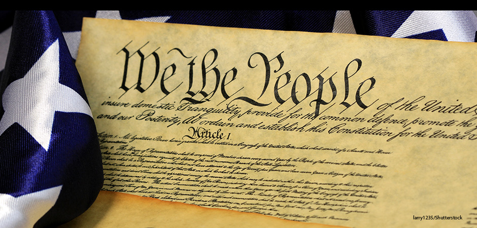 Constitution of the United States and American Flag, We The People