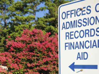 Admissions and financial records aid sign